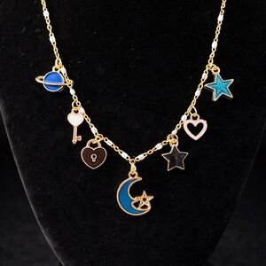 18k Gold Charm Necklace with Blue and Black Accents